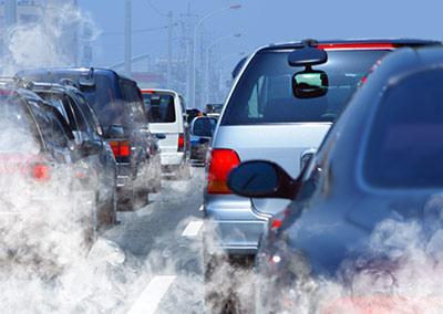 Image of a car with a faulty exhaust system that can be repaired by Active Green + Ross Complete Tire & Auto Centre in Toronto, ON